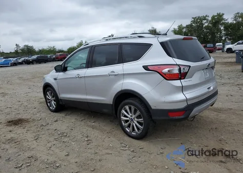 2017 Ford Escape Titanium z USA, uszkodzony, nr VIN 1FMCU9JD7HUE50719